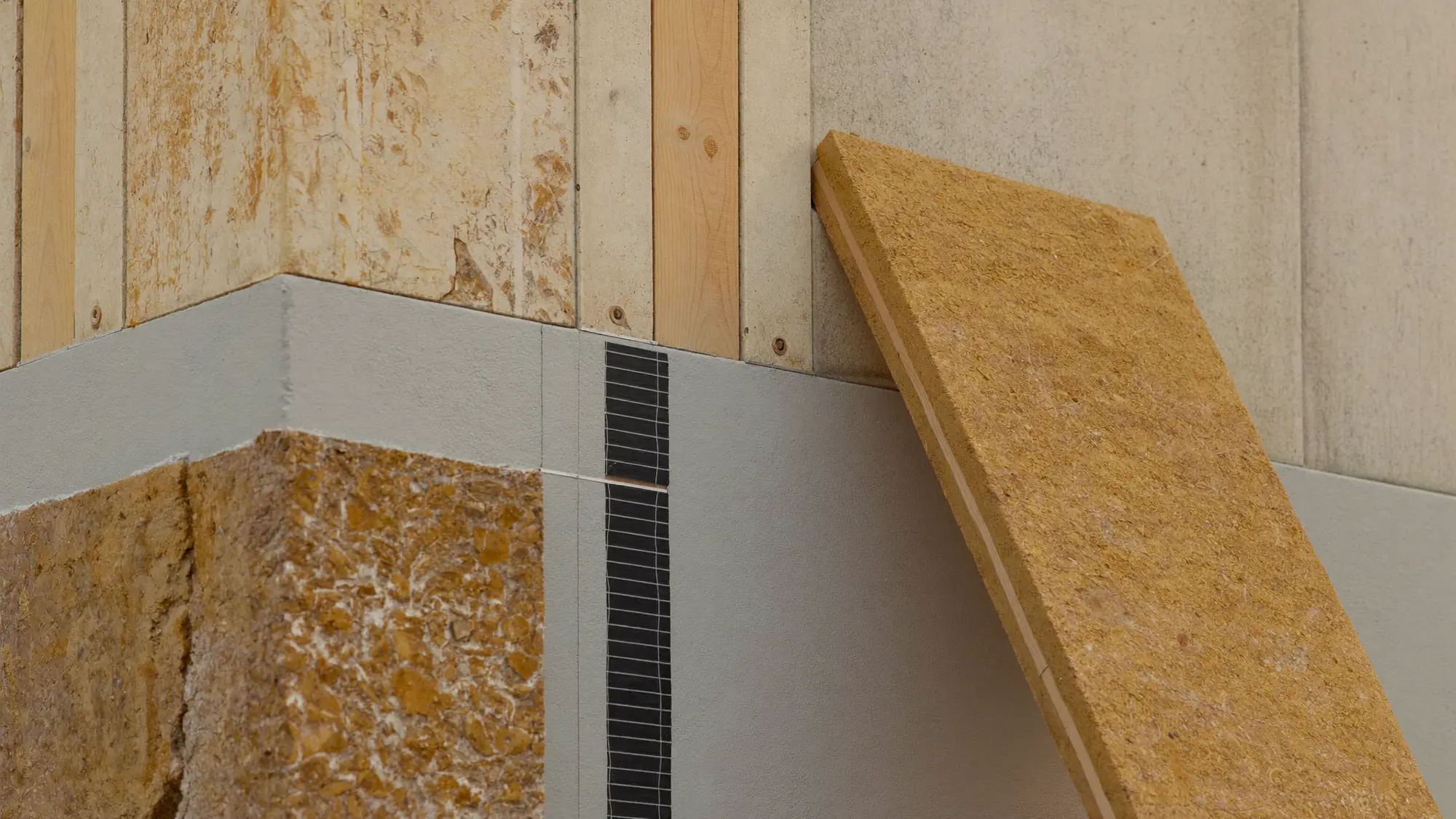 Render orientatiu d'un sistema d'aïllament tèrmic per l'exterior d'una façana.