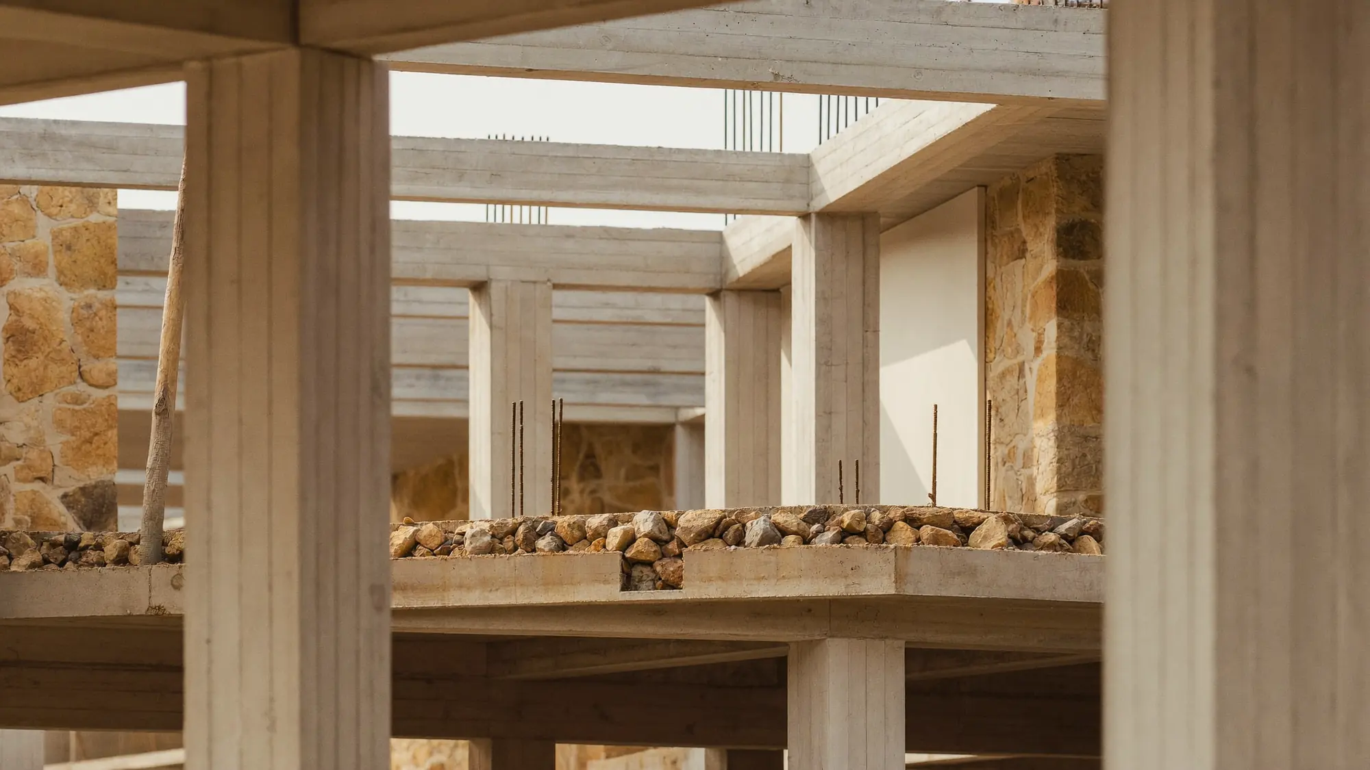 Render orientatiu d'una estructura de formigó armat en construcció.
